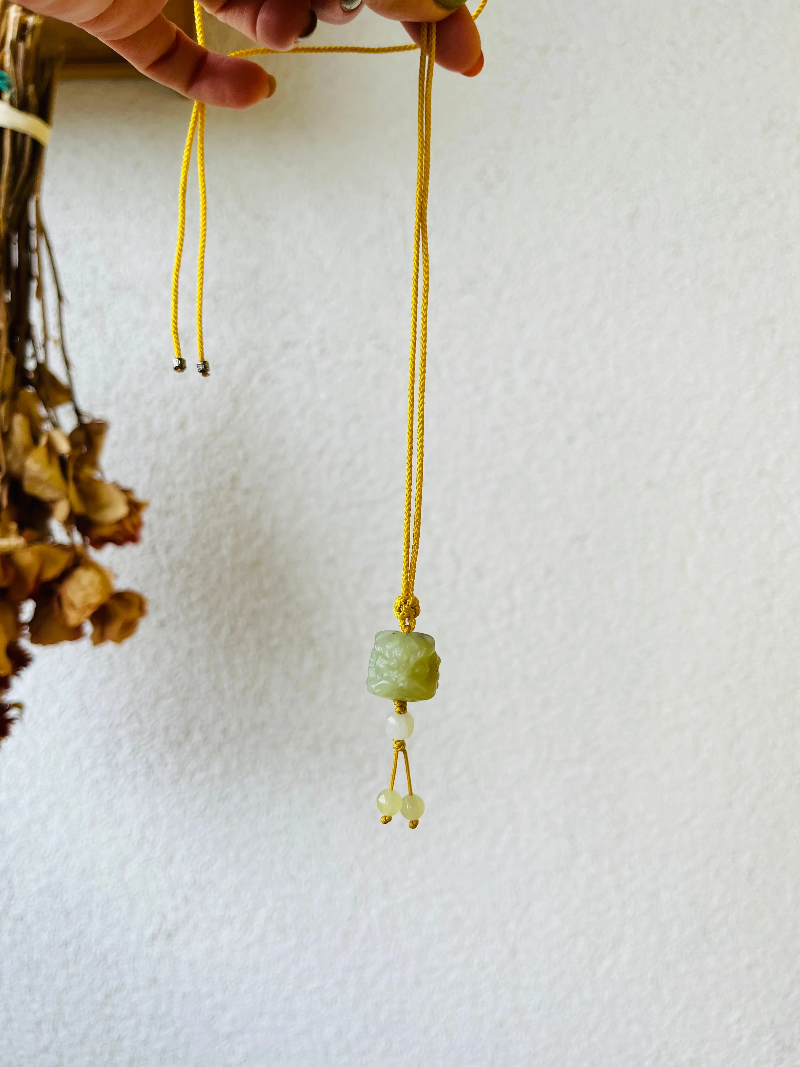 Hand Carved Yellow Jade Chinese Lion Dance Head Pendant